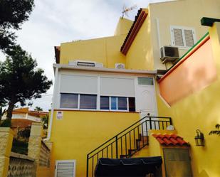 Exterior view of Single-family semi-detached for sale in La Nucia  with Air Conditioner, Terrace and Swimming Pool