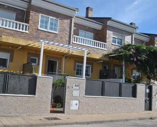 Exterior view of Single-family semi-detached for sale in Cáceres Capital  with Air Conditioner, Terrace and Swimming Pool