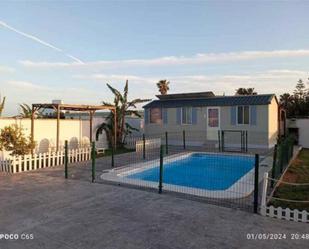 Piscina de Apartament de lloguer en Conil de la Frontera amb Jardí privat, Terrassa i Traster