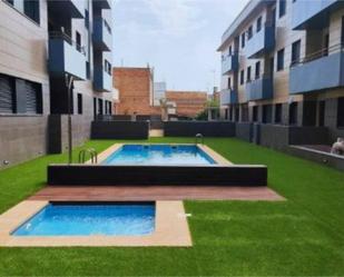 Swimming pool of Flat for sale in L'Aldea  with Air Conditioner, Terrace and Storage room