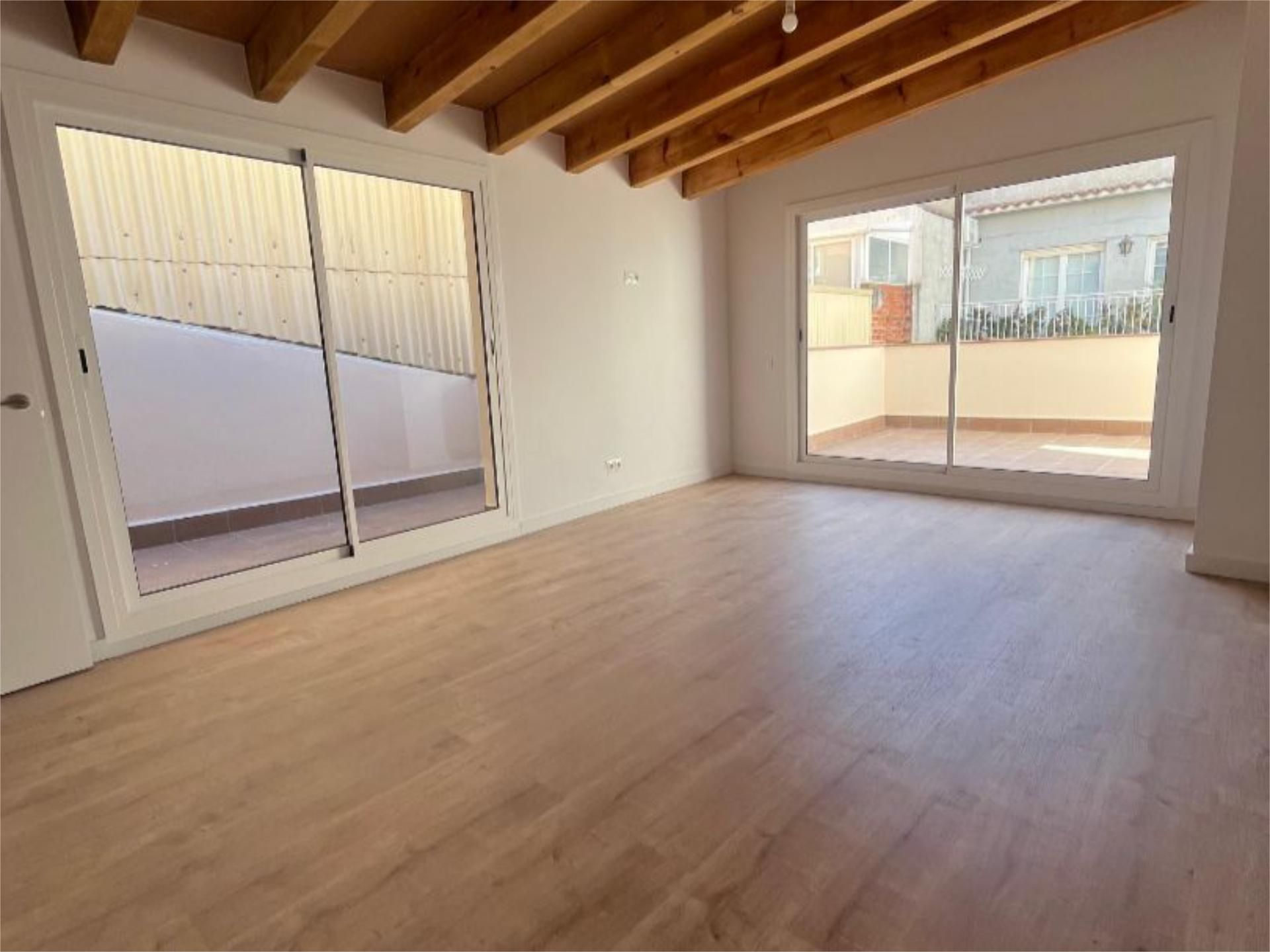 Living room of Single-family semi-detached for sale in Malgrat de Mar  with Air Conditioner, Parquet flooring and Terrace