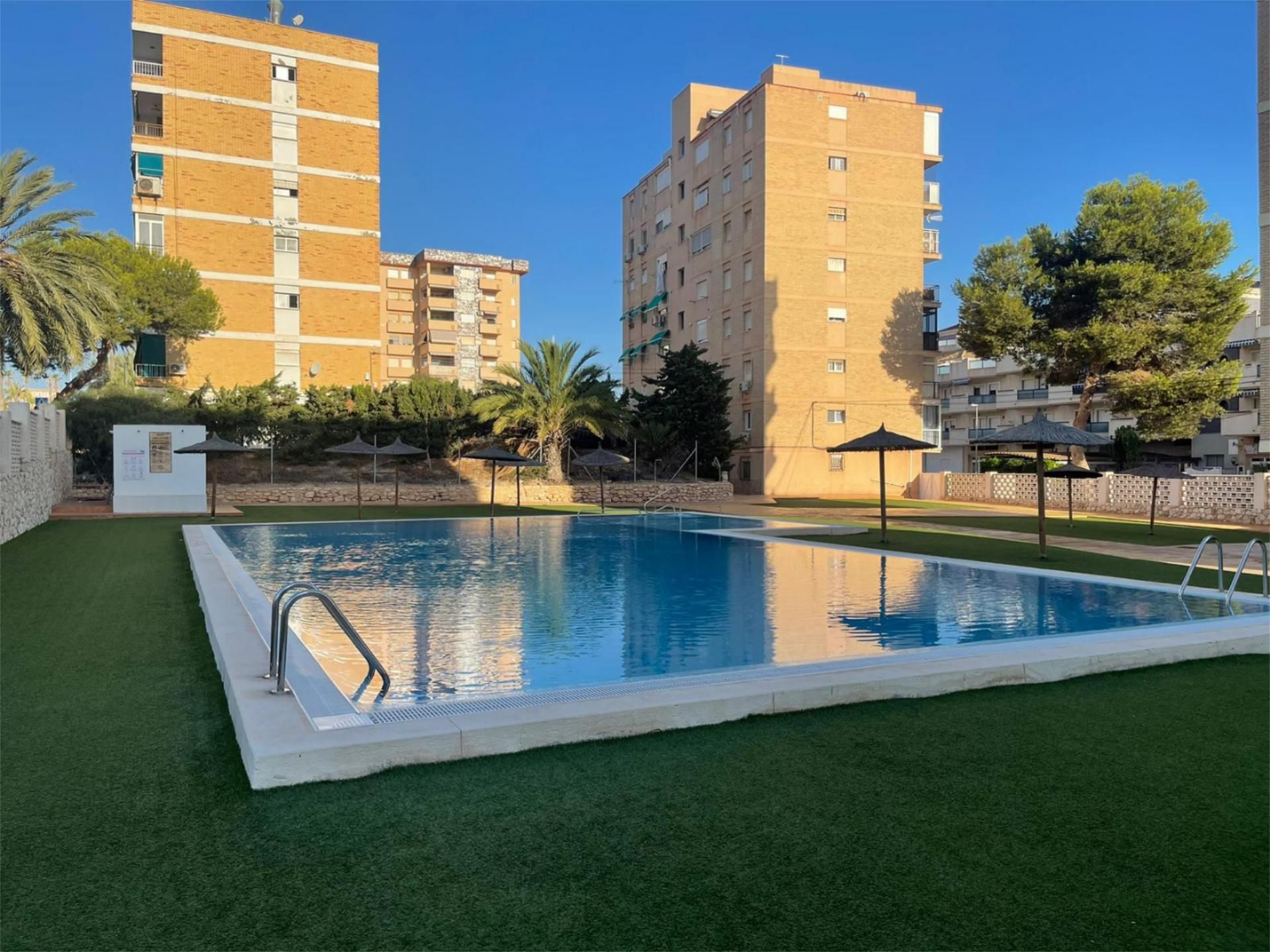 Swimming pool of Flat for sale in Orihuela  with Air Conditioner, Parquet flooring and Storage room