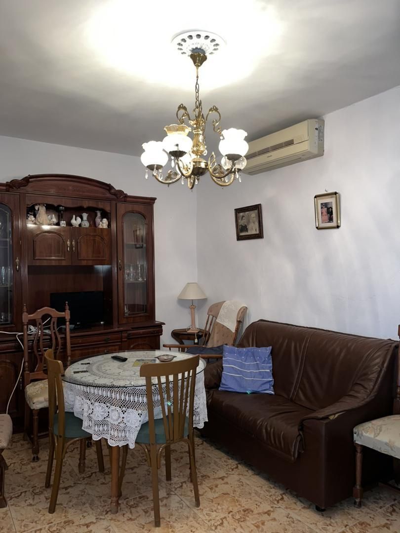 Living room of Planta baja for sale in Alcolea del Río  with Air Conditioner