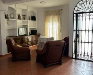 Sala d'estar de Casa o xalet en venda en La Puebla de Cazalla amb Moblat