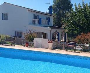 Piscina de Casa adosada en venda en Ontinyent amb Calefacció, Jardí privat i Terrassa