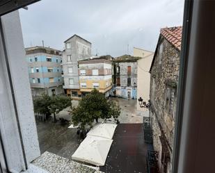 Vista exterior de Casa adosada en venda en A Pobra do Caramiñal amb Traster, Moblat i Forn