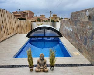 Swimming pool of Single-family semi-detached for sale in Torrevieja  with Air Conditioner, Terrace and Swimming Pool