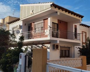 Exterior view of Single-family semi-detached for sale in Águilas  with Air Conditioner, Heating and Private garden