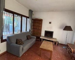 Sala d'estar de Casa adosada en venda en Málaga Capital amb Calefacció, Jardí privat i Terrassa