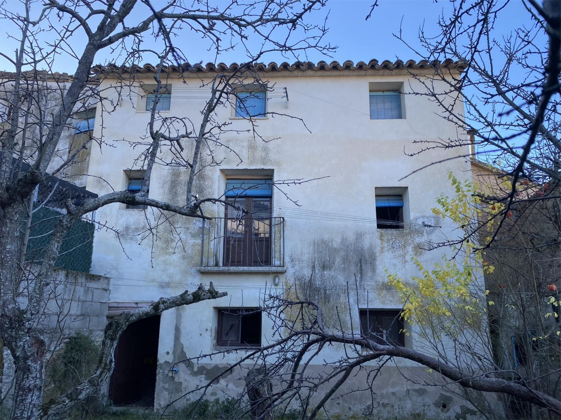 Exterior view of Single-family semi-detached for sale in Pertusa  with Private garden, Storage room and Furnished