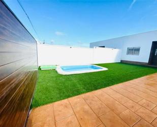 Swimming pool of Single-family semi-detached to rent in Dos Hermanas  with Heating, Private garden and Storage room