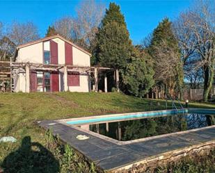 Swimming pool of Single-family semi-detached for sale in Santiago de Compostela   with Heating, Private garden and Storage room