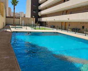 Swimming pool of Flat for sale in Roquetas de Mar  with Air Conditioner, Heating and Swimming Pool