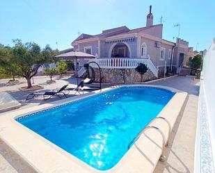 Piscina de Casa o xalet de lloguer en Torrevieja amb Aire condicionat, Jardí privat i Terrassa