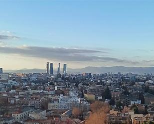 Exterior view of Attic for sale in  Madrid Capital  with Air Conditioner and Terrace