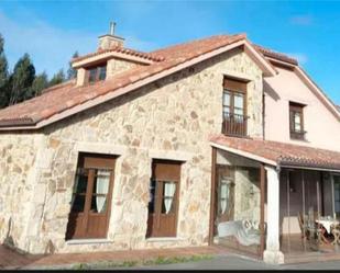 Vista exterior de Casa o xalet en venda en Castrillón amb Calefacció, Jardí privat i Terrassa