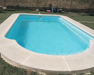 Swimming pool of Country house for sale in Morón de la Frontera  with Air Conditioner, Heating and Private garden