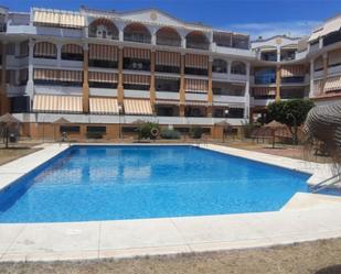 Swimming pool of Flat for sale in Rincón de la Victoria  with Air Conditioner, Terrace and Swimming Pool