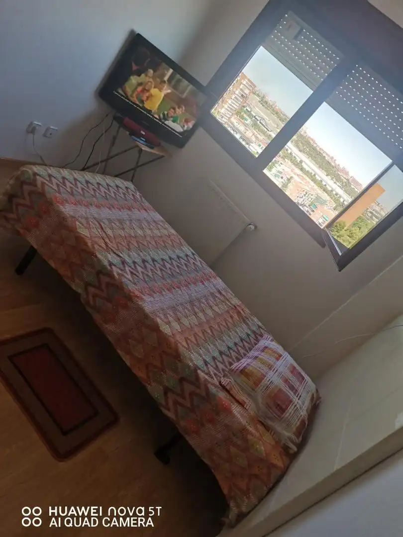Bedroom of Flat for share in Madrid  with Air Conditioner, Heating and Parquet flooring