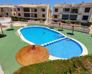 Swimming pool of Duplex for sale in Guardamar del Segura  with Air Conditioner, Heating and Private garden