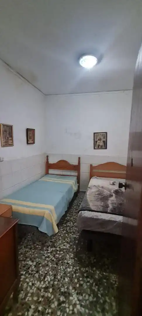 Dormitori de Casa adosada en venda en Gandia