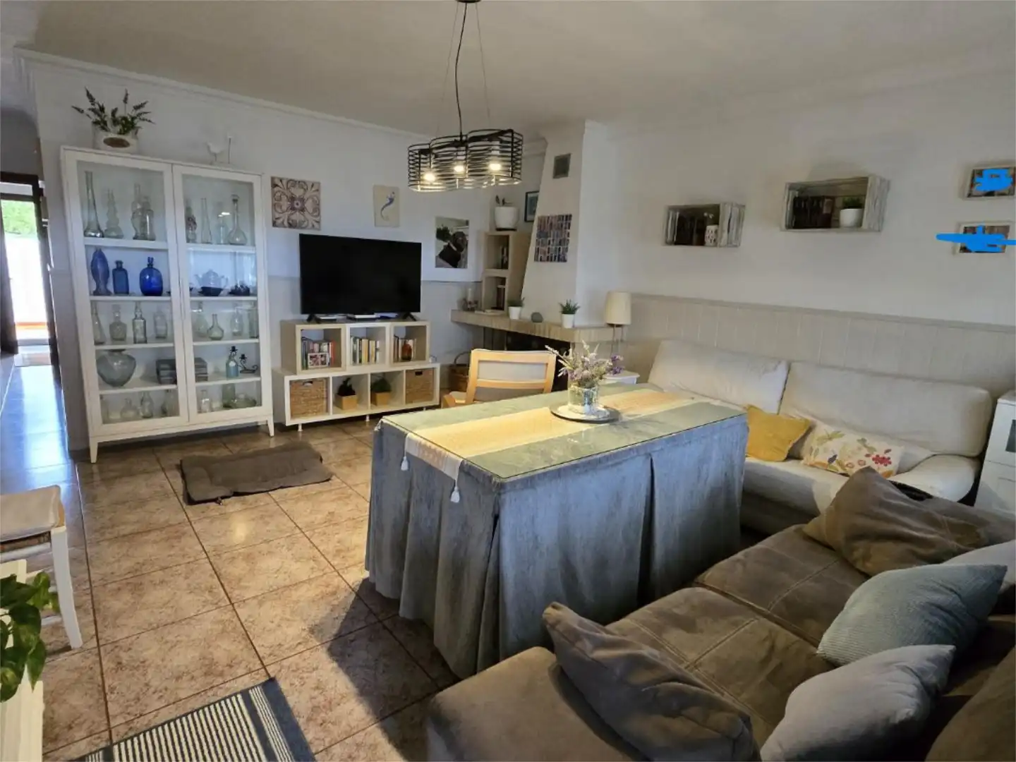 Sala de estar de Casa adosada en venta en Santa Ana la Real con Calefacción, Terraza y Trastero