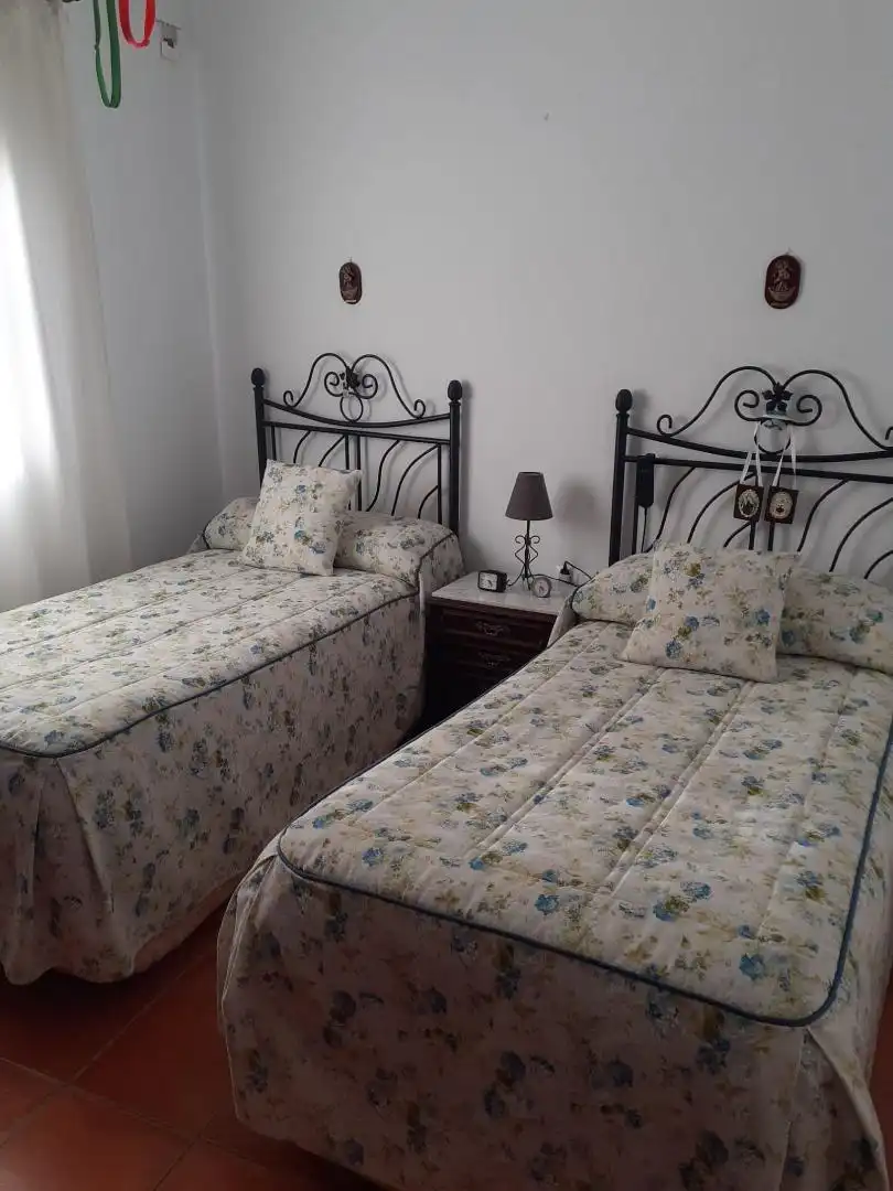 Dormitori de Casa o xalet en venda en El Pedroso amb Aire condicionat i Terrassa