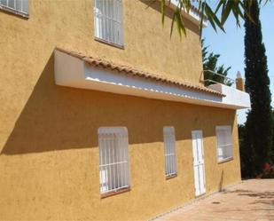 Exterior view of Single-family semi-detached for sale in Bollullos de la Mitación  with Terrace and Swimming Pool