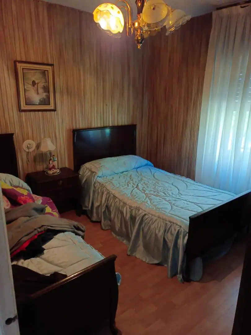 Habitación de Casa adosada en venta en Laviana