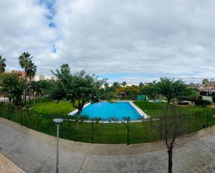 Swimming pool of Single-family semi-detached for sale in  Huelva Capital  with Air Conditioner, Heating and Private garden