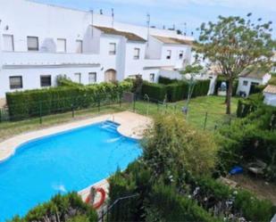 Jardí de Casa adosada en venda en El Rompido amb Aire condicionat, Terrassa i Piscina