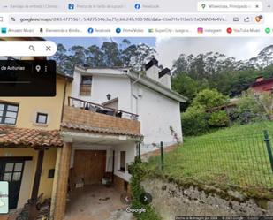 Vista exterior de Casa adosada en venda en Villaviciosa amb Terrassa i Balcó