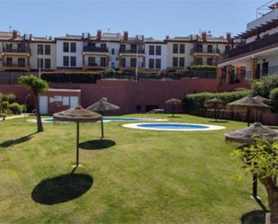 Jardí de Pis de lloguer en Ayamonte amb Aire condicionat, Terrassa i Piscina