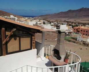 Exterior view of Single-family semi-detached for sale in La Aldea de San Nicolás   with Private garden, Swimming Pool and Furnished