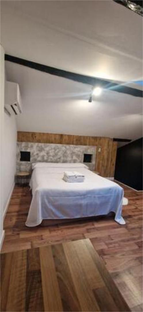 Dormitori de Apartament de lloguer en Babilafuente amb Calefacció, Terrassa i Moblat