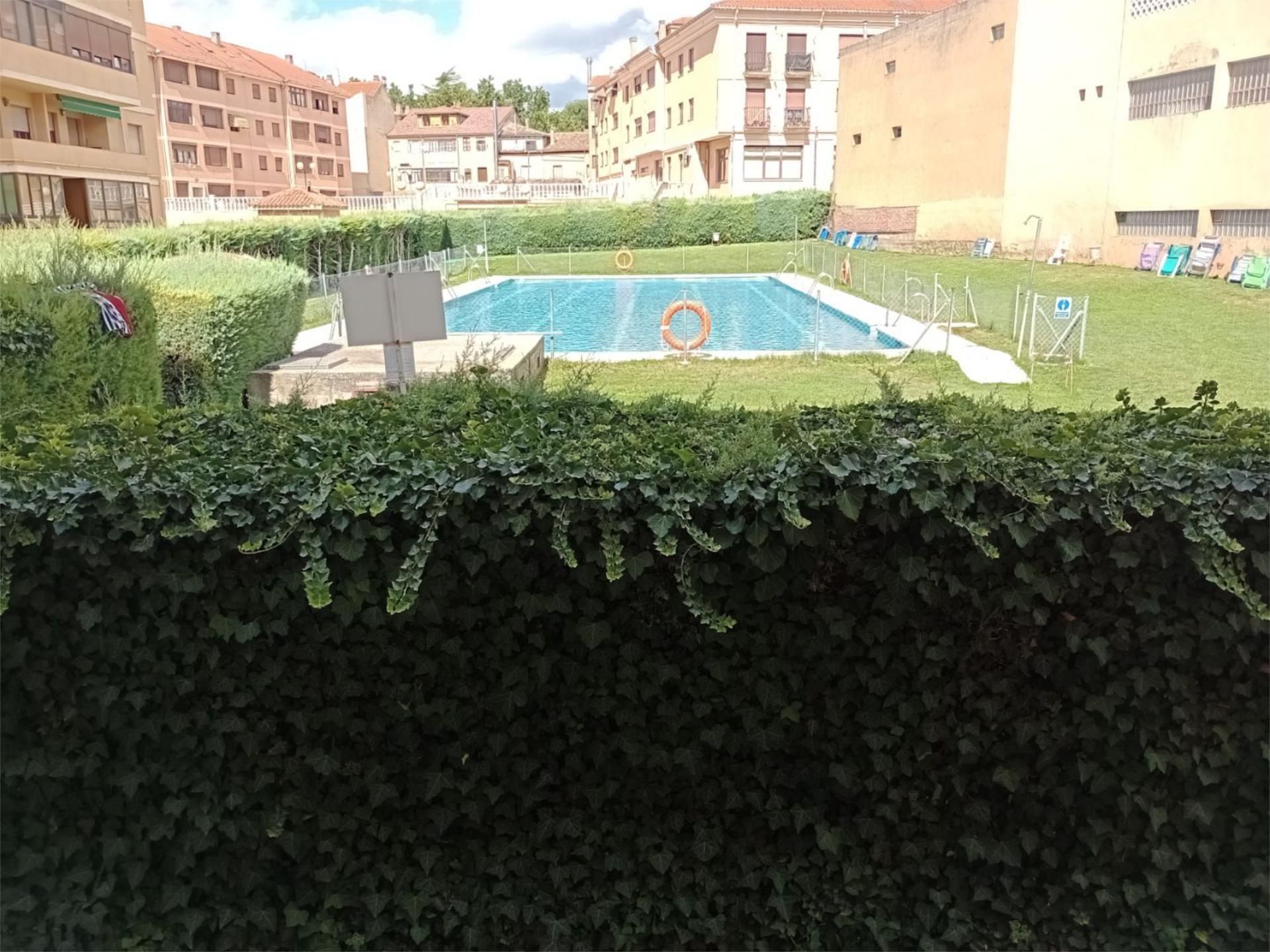 Swimming pool of Flat for sale in Sigüenza  with Heating, Private garden and Parquet flooring