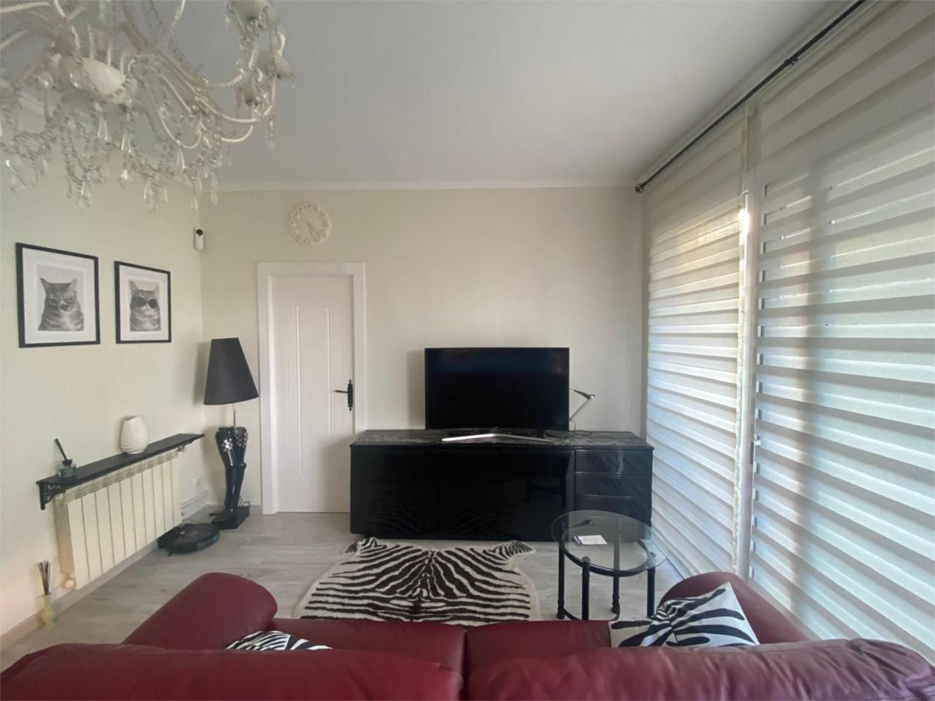 Sala d'estar de Pis en venda en Girona Capital amb Aire condicionat i Balcó