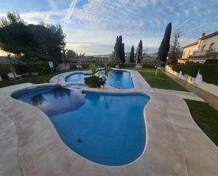 Swimming pool of Single-family semi-detached for sale in Roda de Berà