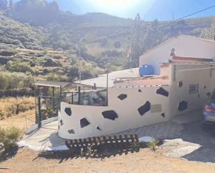 Vista exterior de Casa o xalet en venda en Vega de San Mateo amb Aire condicionat, Calefacció i Jardí privat