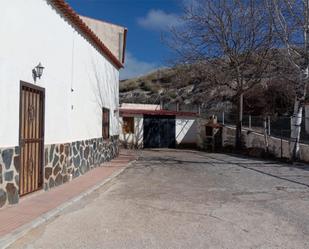 Vista exterior de Casa o xalet en venda en Castilléjar amb Jardí privat, Terrassa i Traster