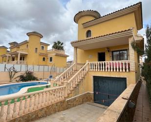 Exterior view of Single-family semi-detached for sale in Orihuela  with Air Conditioner, Private garden and Terrace