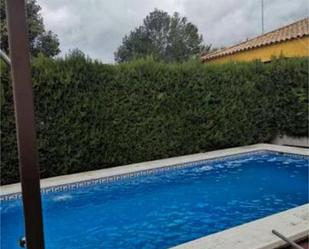 Swimming pool of Single-family semi-detached for sale in Carmona  with Heating, Private garden and Storage room