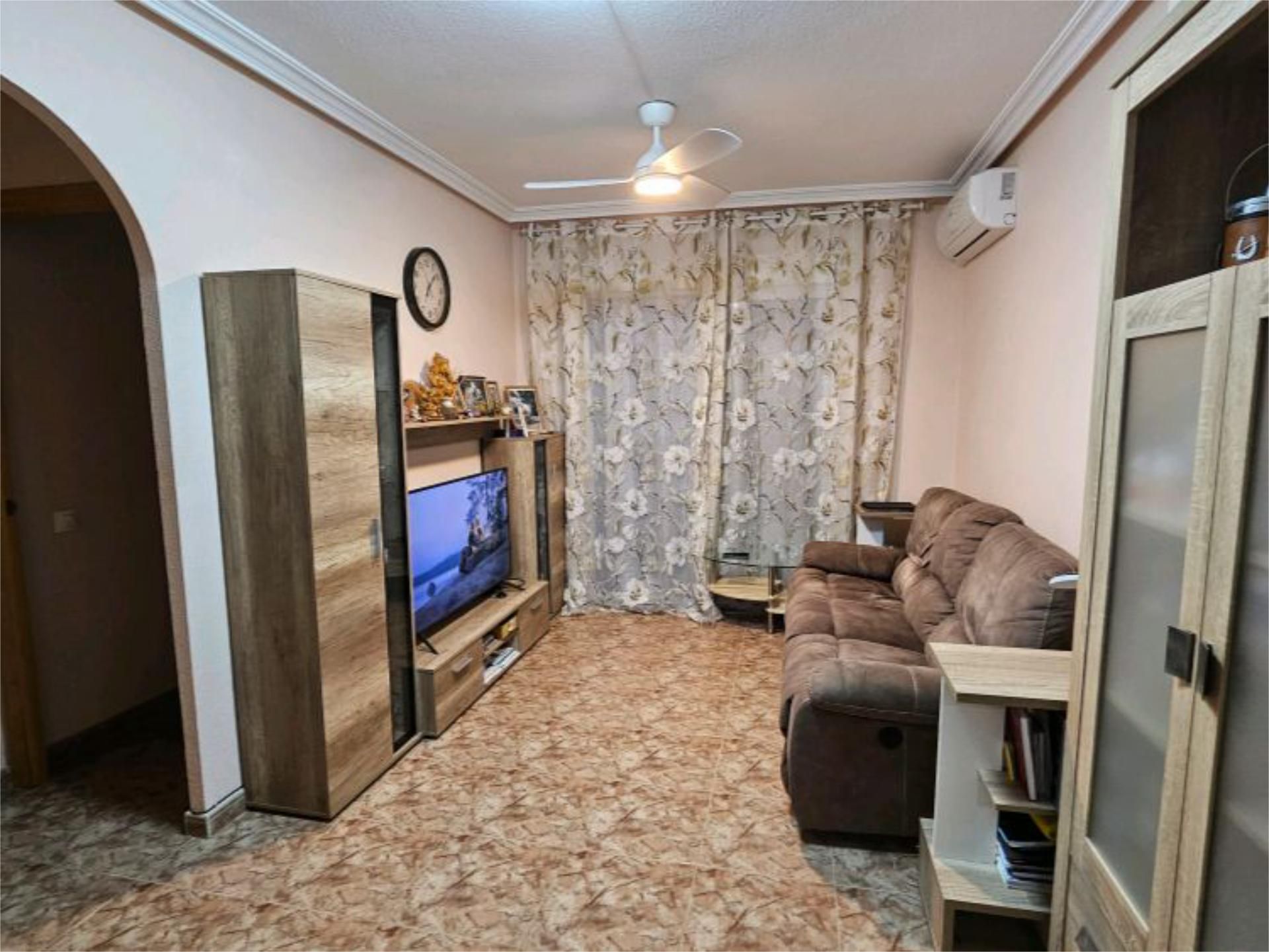 Living room of Flat for sale in Torrevieja  with Air Conditioner and Balcony