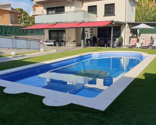 Swimming pool of House or chalet for sale in Cunit  with Air Conditioner, Terrace and Swimming Pool