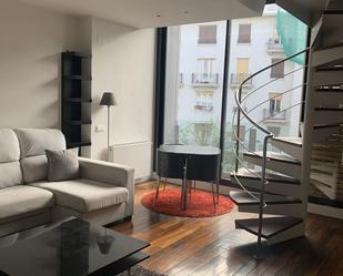 Living room of Duplex to rent in  Madrid Capital  with Air Conditioner, Heating and Parquet flooring