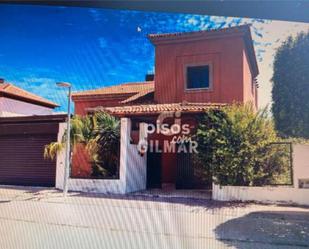 Exterior view of Single-family semi-detached for sale in Palomares del Río  with Terrace