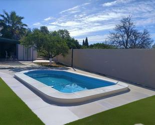 Piscina de Casa o xalet de lloguer en Sanlúcar la Mayor amb Aire condicionat, Calefacció i Jardí privat