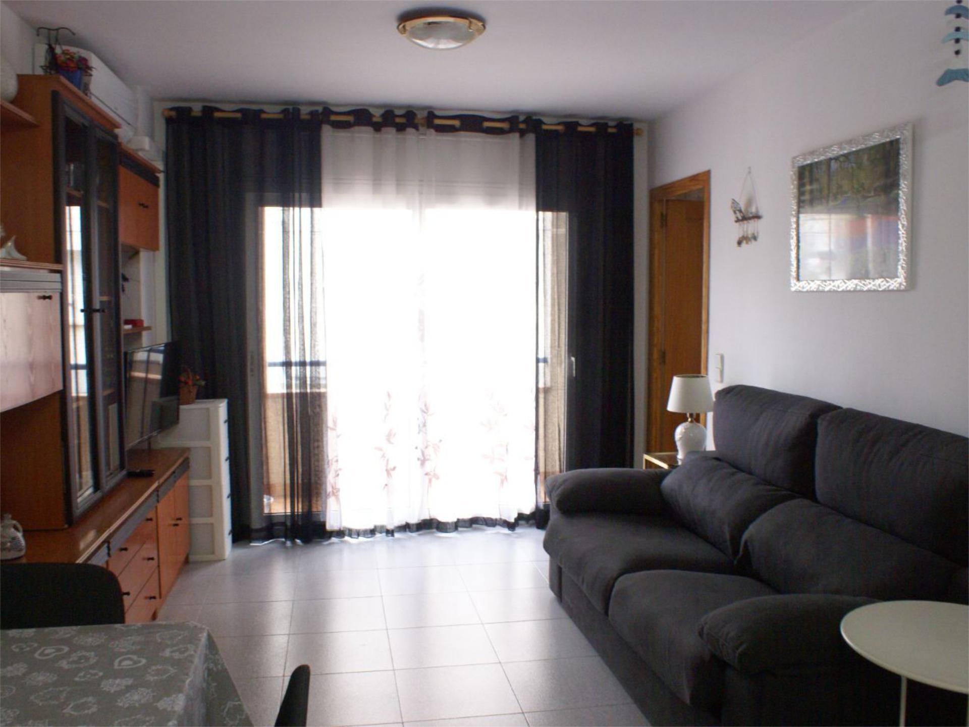 Living room of Flat for sale in Blanes  with Air Conditioner and Balcony