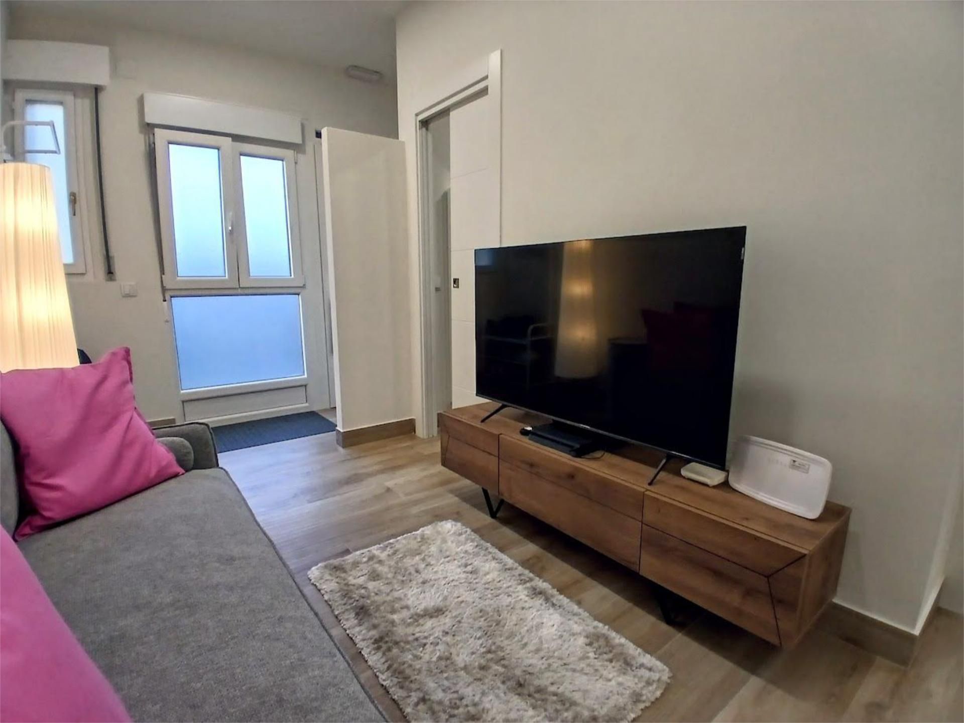 Living room of Flat to share in Piélagos  with Air Conditioner, Heating and Parquet flooring