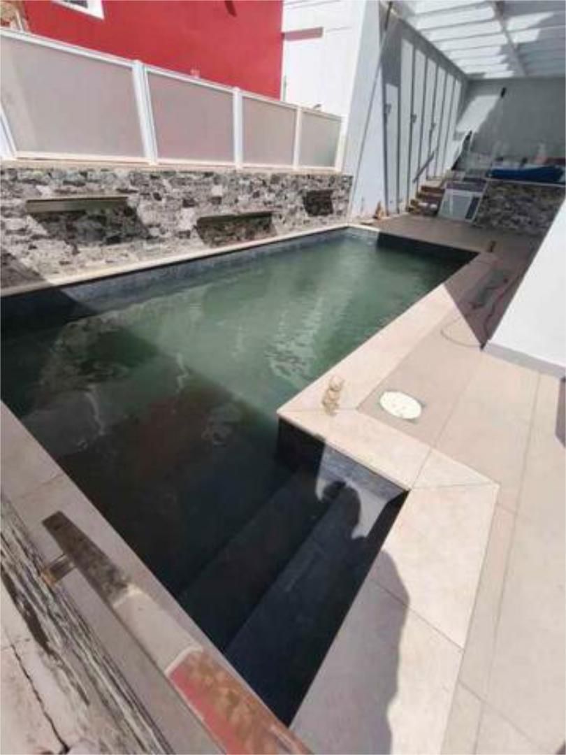 Piscina de Casa adosada en venda en Santa Lucía de Tirajana amb Calefacció, Jardí privat i Terrassa